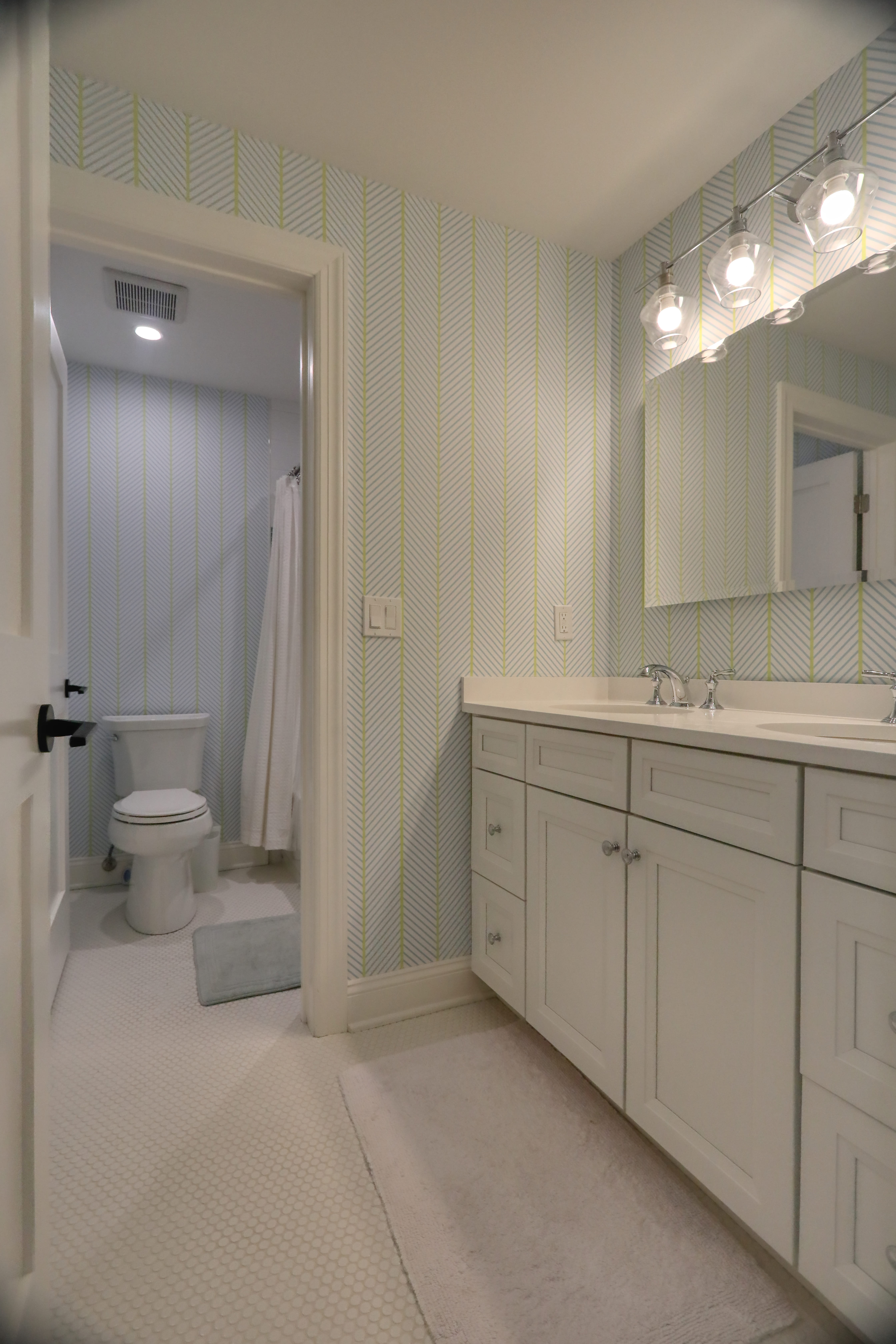 Modern Minimalist farmhouse bathroom by Raymond Design Builders in Connecticut