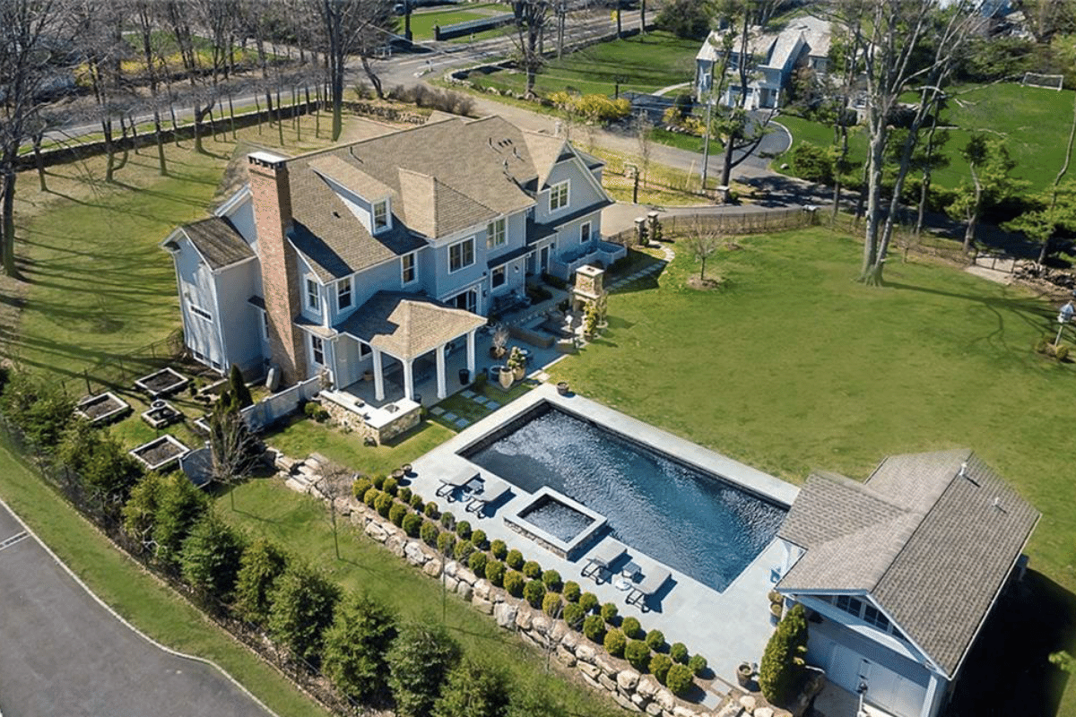 skyview of house with pool and pool house